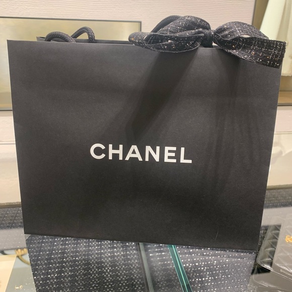 CHANEL Handbags - Authentic Chanel dust bag with strings, mid size , brand new condition.